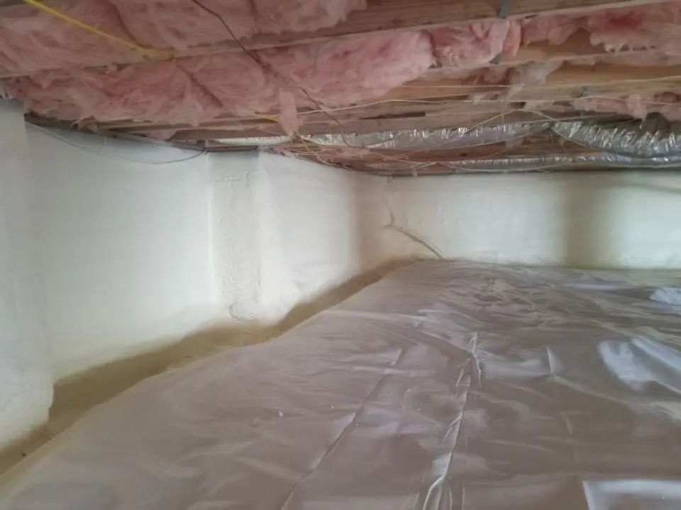 Crawl space encapsulation with closed-cell spray foam for Commercial Roof Restoration in North Chicago